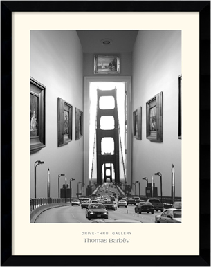 A photo of cars driving on a bridge, inside a gallery with pictures on the walls beside the road.